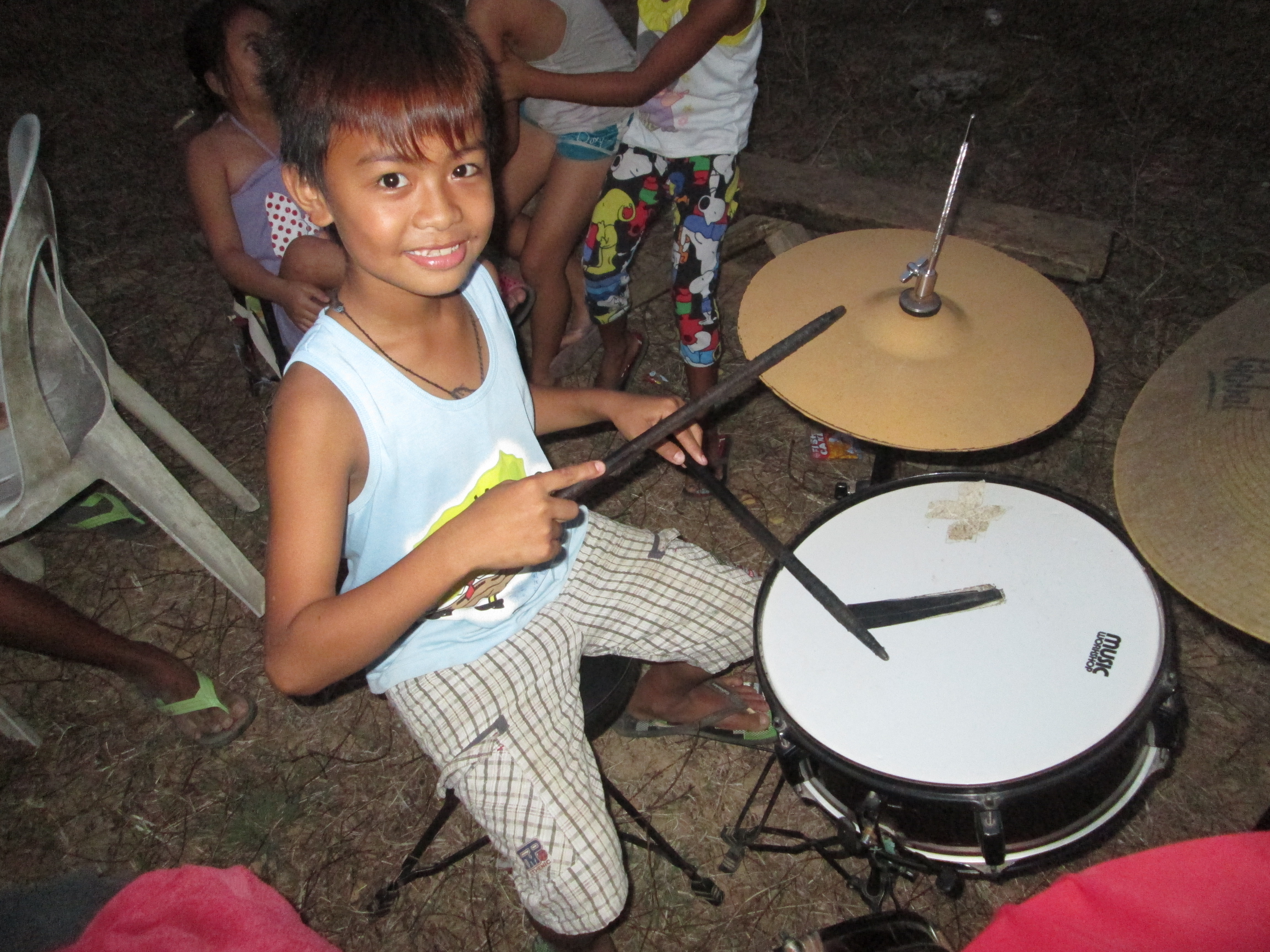 Young drum student learning rhythm and technique during a lesson